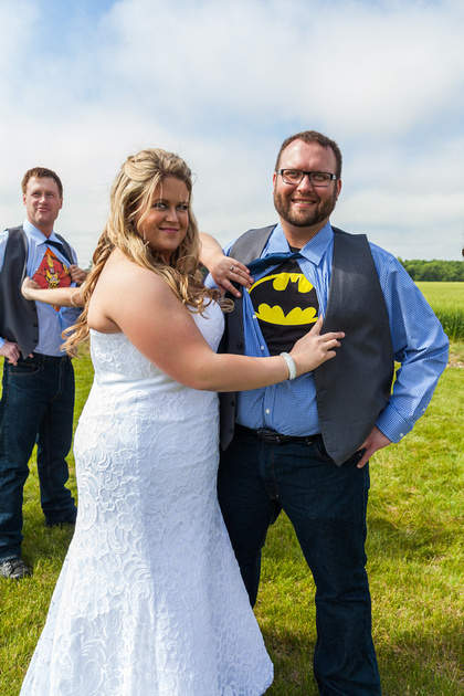 The bride with her superhero groom 