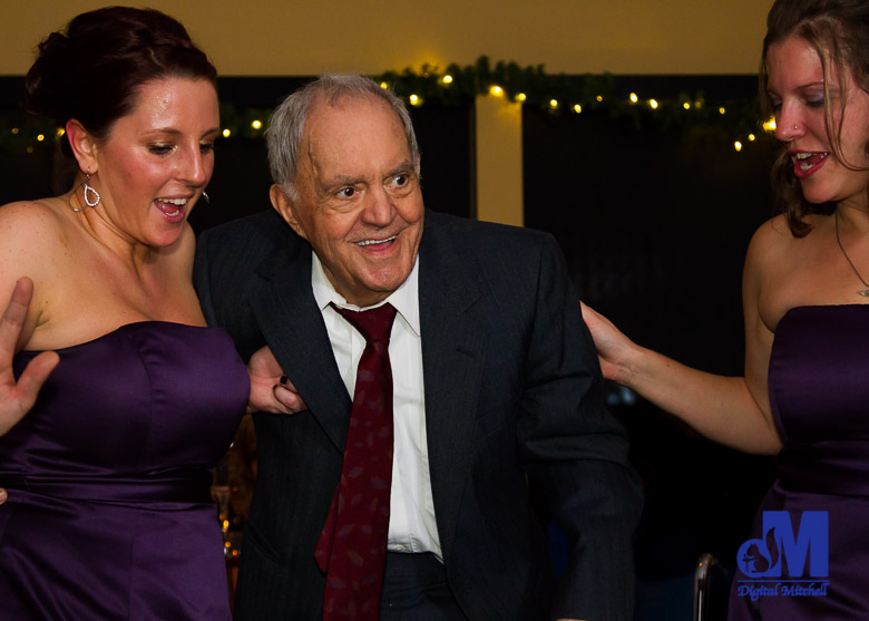 Photograph of Pat with Bridesmaids at wedding photographed by Michael and Dawn Wedding Photography