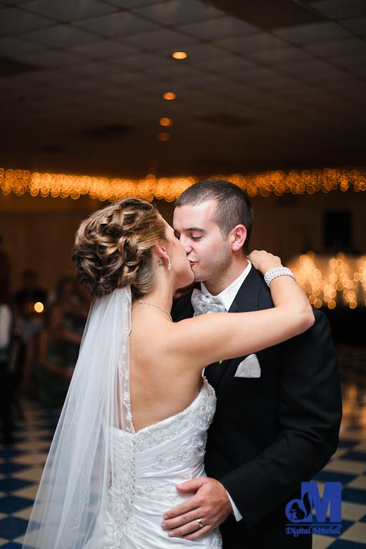 photographing the wedding couple's first dance