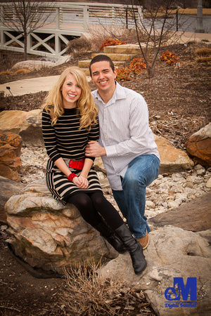 Photograph on rocks of engagement couple