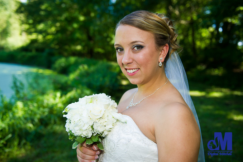 photograph of bride and bouquet flowers